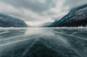 Frozen Lake With Cracked Ice Under Dramatic Cloudy Sky In Winter photo