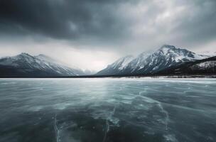 Frozen Lake With Cracked Ice Under Dramatic Cloudy Sky In Winter photo
