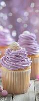Lavender Frosted Cupcakes Displayed on a Wooden Surface photo