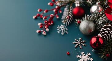 Christmas Ornaments on Evergreen Branches With Snowfall in Winter Setting photo