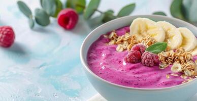 Dragon Fruit Smoothie Bowl With Banana And Raspberries photo