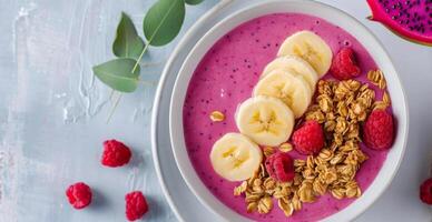 Dragon Fruit Smoothie Bowl With Banana And Raspberries photo