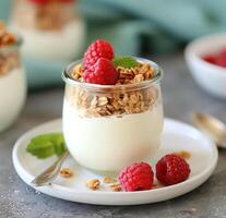 Yogurt Parfait With Raspberries And Granola photo