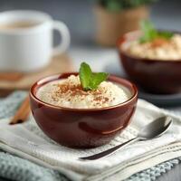 Cinnamon Rice Pudding With Mint Garnish photo