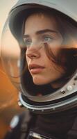 Woman in Space Suit Looking Out Window photo