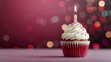 Single Birthday Cupcake With Sprinkles And Candle photo