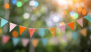 Colorful Bunting Flags Against Sunny Background photo