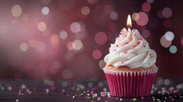 Single Birthday Cupcake With Sprinkles And Candle photo