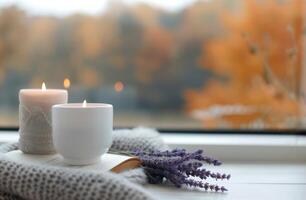 velas y lavanda por el ventana foto
