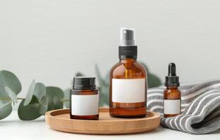 Amber Bottles With Dropper On Wooden Tray photo