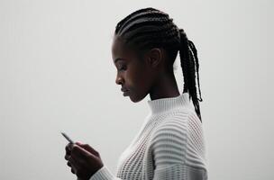 Woman Using Smartphone in Hallway photo