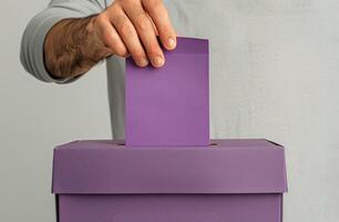 Woman Casting Ballot in Election photo