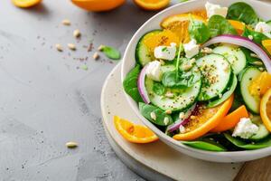 Spinach Salad With Orange and Cucumber photo