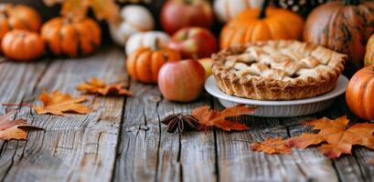 Autumn Tabletop With Pie and Pumpkins photo