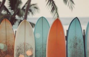 Surfboards Leaning on a Rail at Sunset photo