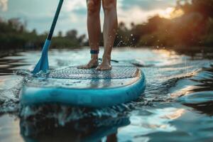 woman sitting on sup board . photo
