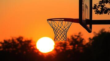 Basketball Hoop Against Sunset photo