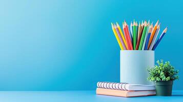 Back to school. On a blue isolated background photo