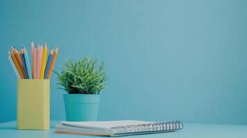 Back to school. On a blue isolated background photo