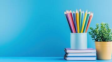 Back to school. On a blue isolated background photo