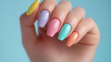 Woman hand with pastel rainbow color photo