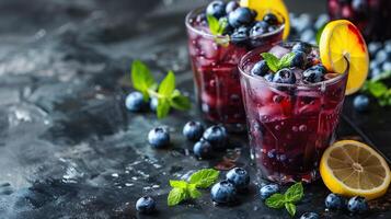 Blueberry Cocktail with fresh organic fruits and herbs photo