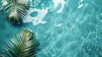 Top view of palm leaf on water background Tropical summer design inspiration photo