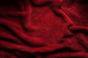 A soft red terry towel. Burgundy texture back. Underlay and free space for text. photo