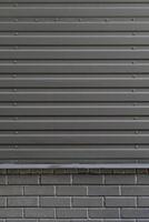 Gray city wall. Dark gray urban background. Copy space for text.Abstract background corrugated gray metal for wall pattern, industrial. photo