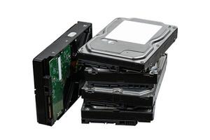 Hard drives stacked on top of each other. SATA 3.5 HDD for information storage. Isolate on a white back. photo