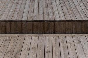 Light wooden back. Rough boards. Natural wood texture and pattern. photo