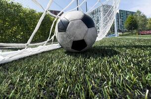 Goal in the back of net in soccer game photo