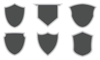 Collection of blank shield badges in different shapes vector