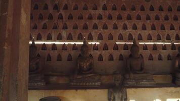 Vientiane, Laos - November 14, 2023 - Statue of Buddha Image in Wat Sisaket, one of the oldest Buddhist temple video