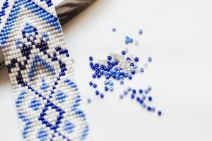 Geometric pattern on the gerdan ornament, Ukrainian beaded ornament, amulet. photo