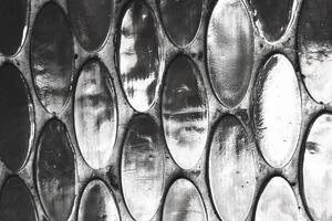 Texture of mother-of-pearl mosaic round tiles, close-up photo