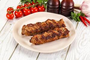 Chicken kebab minced meat and spices photo