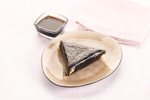 Japanese traditional onigiri with fish photo