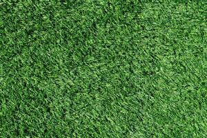 Above view of green Artificial grass. Used for decorating the garden around the house to remove weeds or for cleanliness. for background and textured. photo