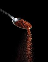 Generated image - closed-up photography of Smoked Paprika Spilled from a Teaspoon photo