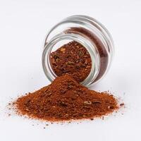 Generated image - closed-up photography of Smoked Paprika Spilled from a jar photo
