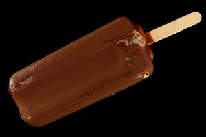 Chocolate ice cream on a stick photo
