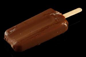 Chocolate ice cream on a stick photo
