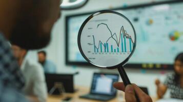 Close-Up of Magnifying Glass Focused on Stock Market Indicators with Blurred Background photo