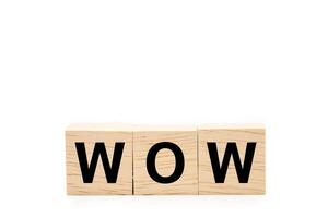 WOW word wooden blocks isolated on white background. Copy space and Clipping Path. photo