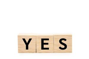 Wooden blocks with YES wording. Business and education concept. Strategy, marketing, management theme. isolated on white background. Copy space and Clipping path. decision making concept. photo