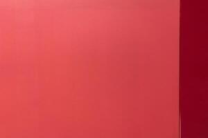 Red Abstract background, darker red on the right, suitable for standalone background or as a design element in various creative projects. photo