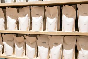 Refill packet. Zero waste. Reuse reduce recycle concept. refill liquid soap, shampoo and other products. Plastic packaging for refill pouch in store. photo