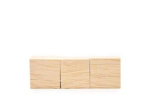 Three blank wooden blocks isolated on white background. Empty wooden cubes for text. Copy space and Clipping Path photo