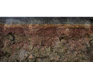 The curb erosion from storms. To indicate the layers of soil and rock. photo